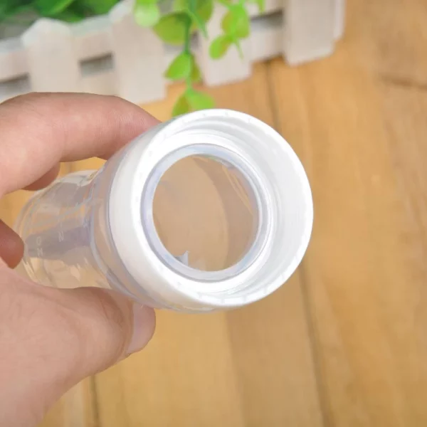 Baby Spoon Feeder Silicone Bottle Feeding (Random Color) - Image 4